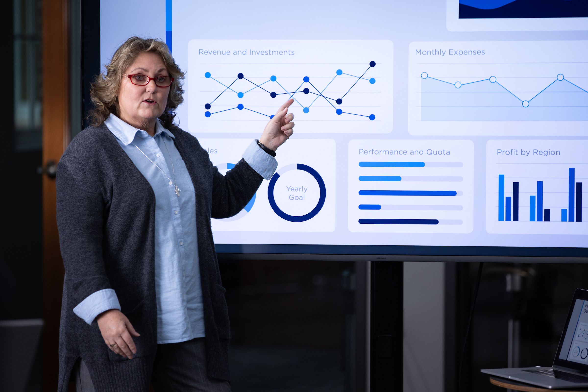 Business executive utilizing her corporate communication strategic communication degree to present information