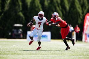 Malik Willis Stiff Arms a Defender