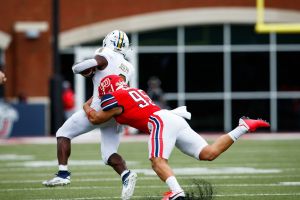 Defender Takes Down FIU Player